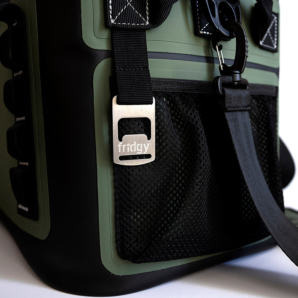 Diagonal close-up of Fridgy 14L CribMate in Commando Green showcasing built-in bottle opener – Insulated soft cooler with durable construction, waterproof zipper, and reinforced design for outdoor and worksite use.