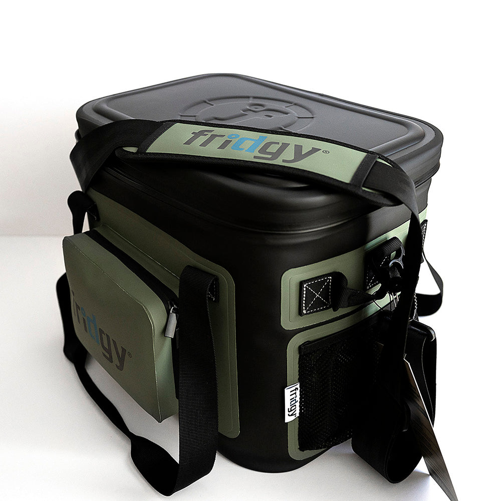 High-angle diagonal view of Fridgy 14L CribMate in Commando Green – Insulated soft cooler showcasing its waterproof zipper, reinforced handles, and durable construction for keeping food and drinks fresh.