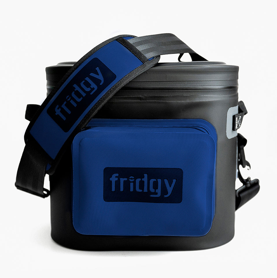 Blue 8L Fridgy Cribmate cooler bag on a white background